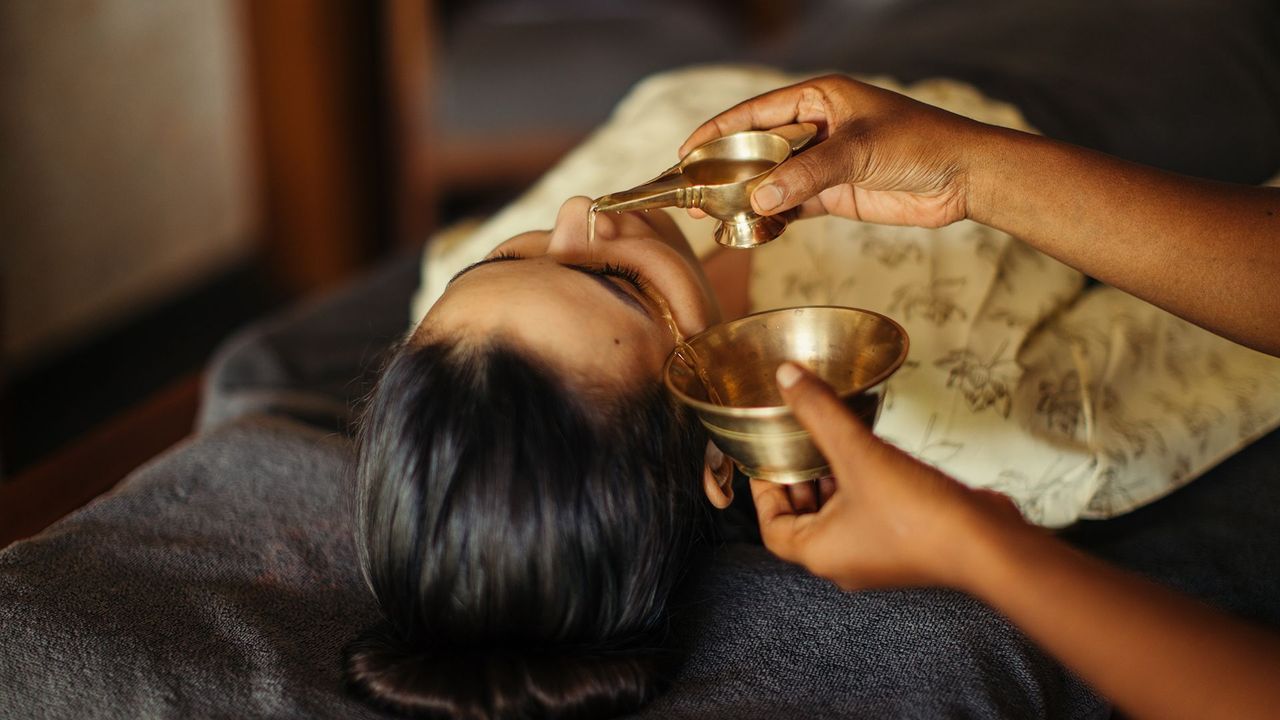Experience a traditional Ayurvedic spa treatment.